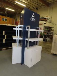 Custom Triangle Kiosk with Shelves, Locking Storage, and Graphics -- View 2