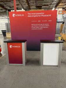 RENTAL: RE-1080 Inline Design with 110" Wide x 96" High Backwall, Boomerang Baseplates, Large Monitor Mount, (2) RE-1227 Small Rectangular Counters, SEG Fabric Graphic, and Direct Print Sintra Graphics